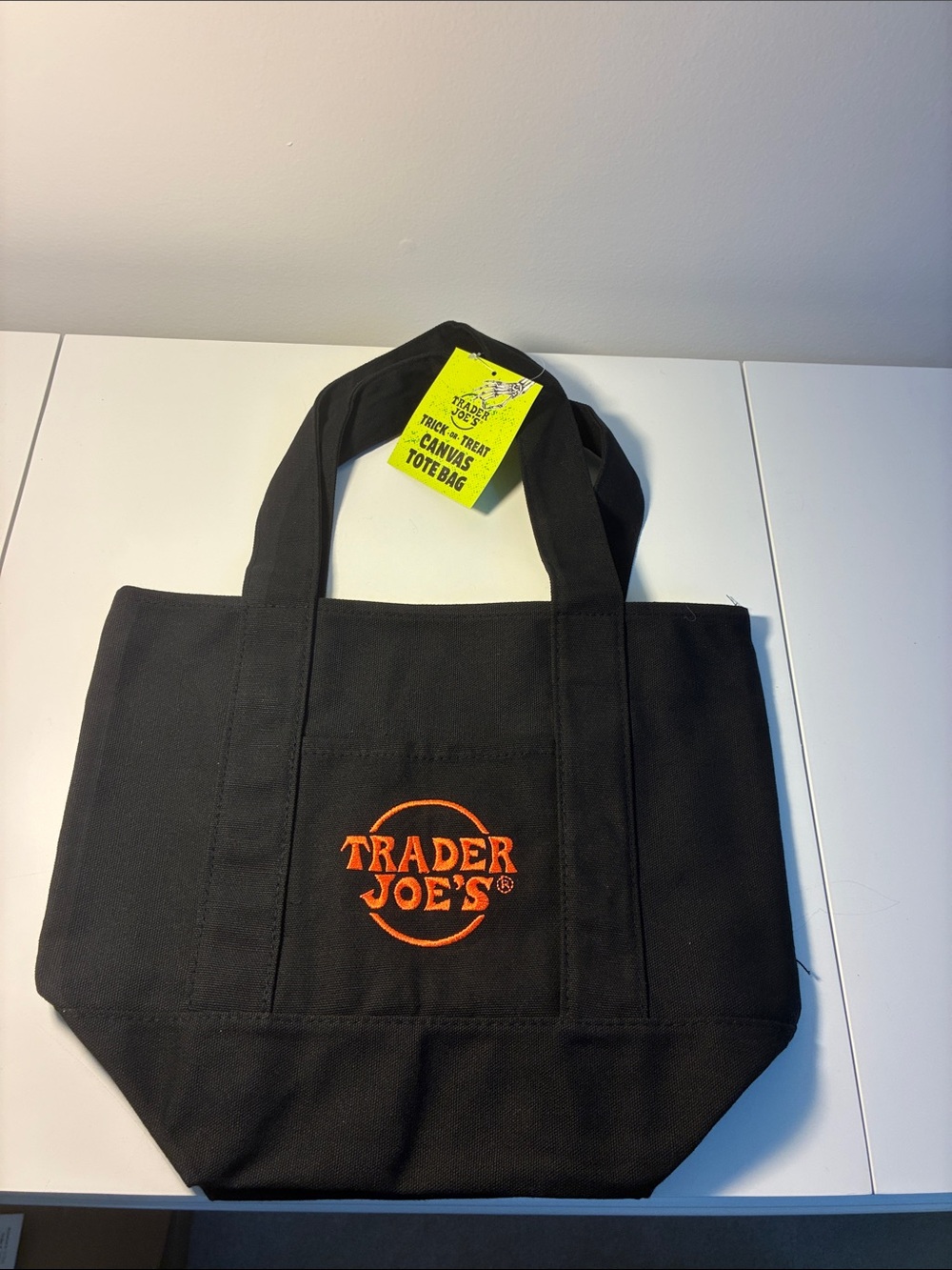 Trader Joe's Black Canvas Tote Bag with Orange Logo